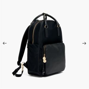 Lo & Sons Rowledge 2 Black Backpack with Gold Details and Lavender Interior.